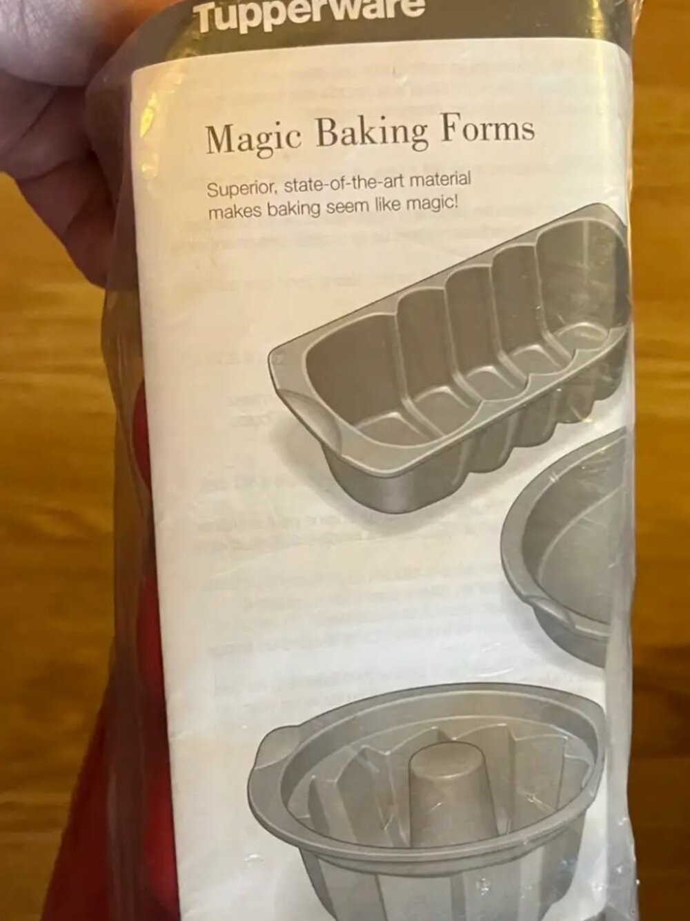 NEW in plastic Tupperware silicone baking loaf pan